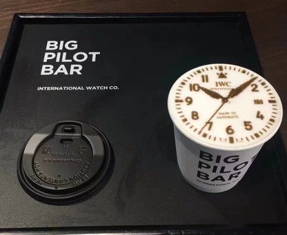 clock on the surface of the coffee