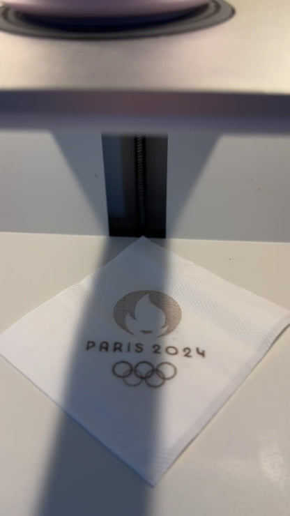 video logo Paris 2024 on coffee